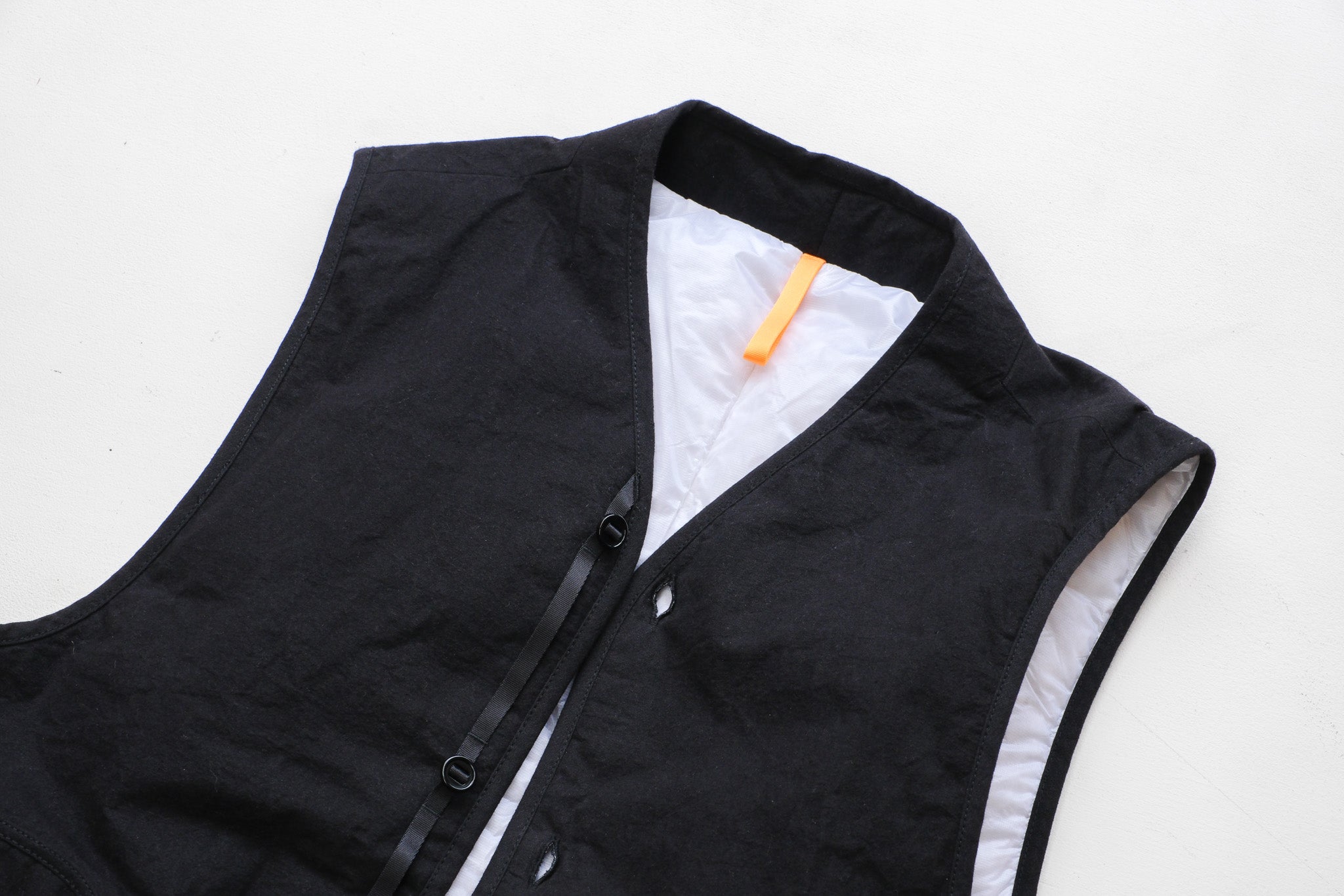 MAN-TLE  R19D5 "Down Shied Vest" Black Wax